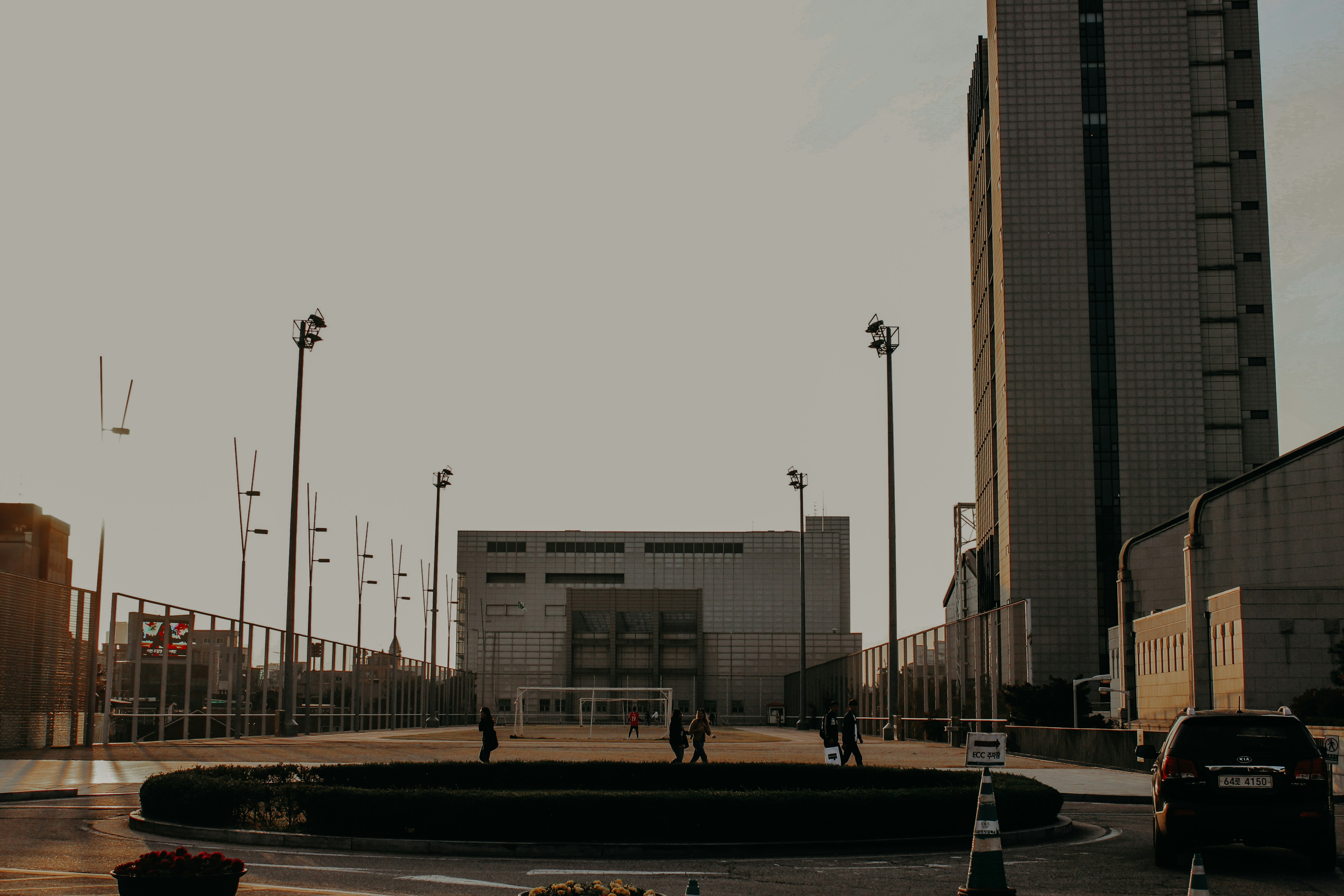 white concrete building near road during daytime